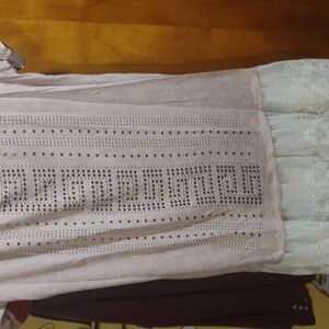 Cute Top with sequins and lace. Just sits in the closet